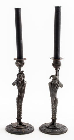 Pair of Allegorical Figure Metal Candlesticks